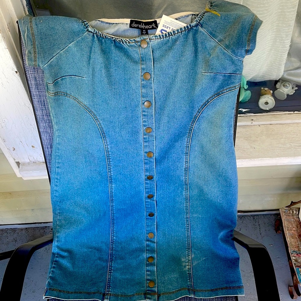 I’m selling a NEW blue Jean dress from Ross . Never worn .